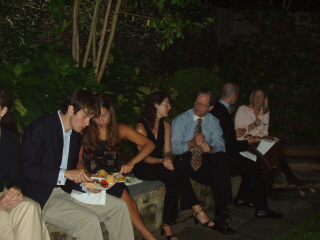 Sitting on the wall at the engagement party